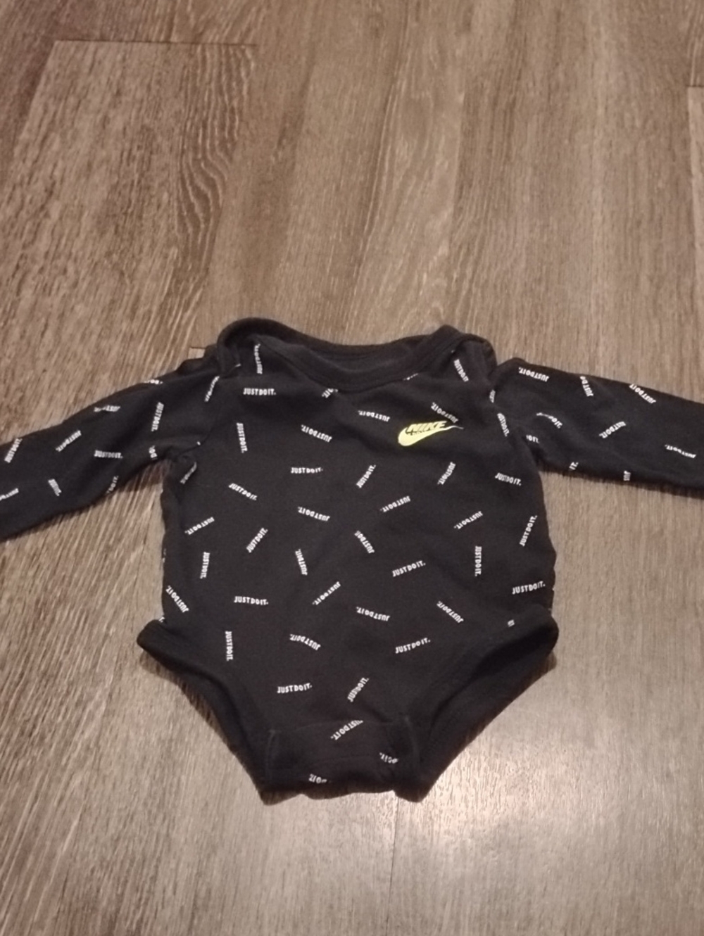 Black Infant Long Sleeve Onesie In Size Newborn